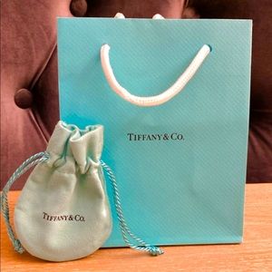 Tiffany’s paper bag (small) and Pouch (small).
